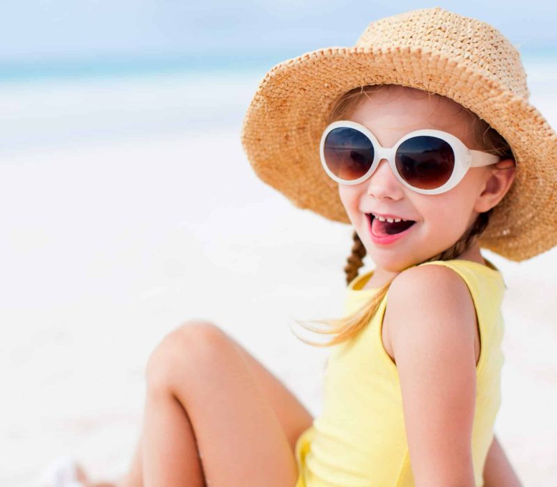 Adorable,Little,Girl,At,Beach,On,Summer,Vacation
